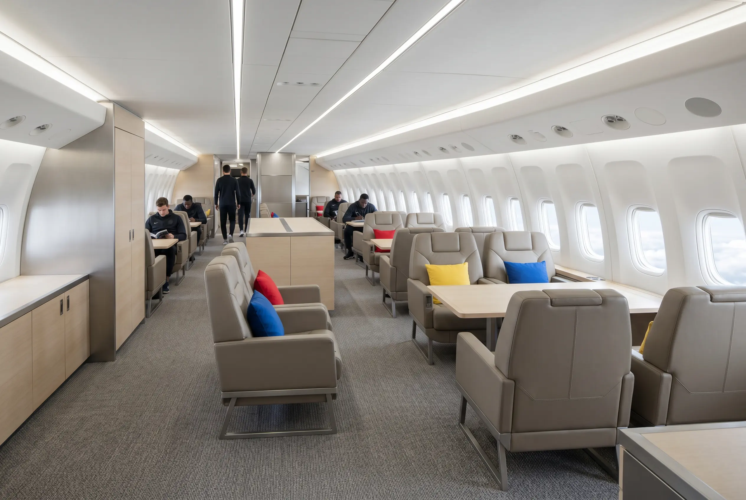 Large jet cabin laid out for a sports team traveling Miami to New York